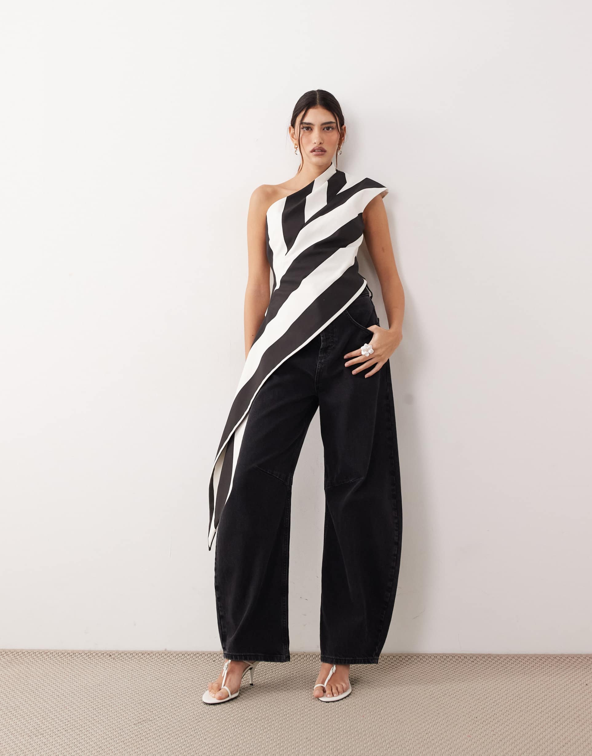 arrange one shoulder draped top in black and white stripes