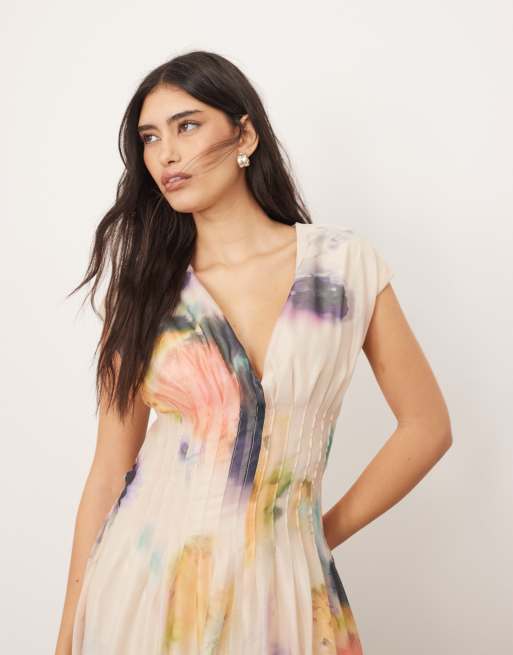 ARRANGE organza pleat waist midi dress with tie back detail in blurred  floral | ASOS