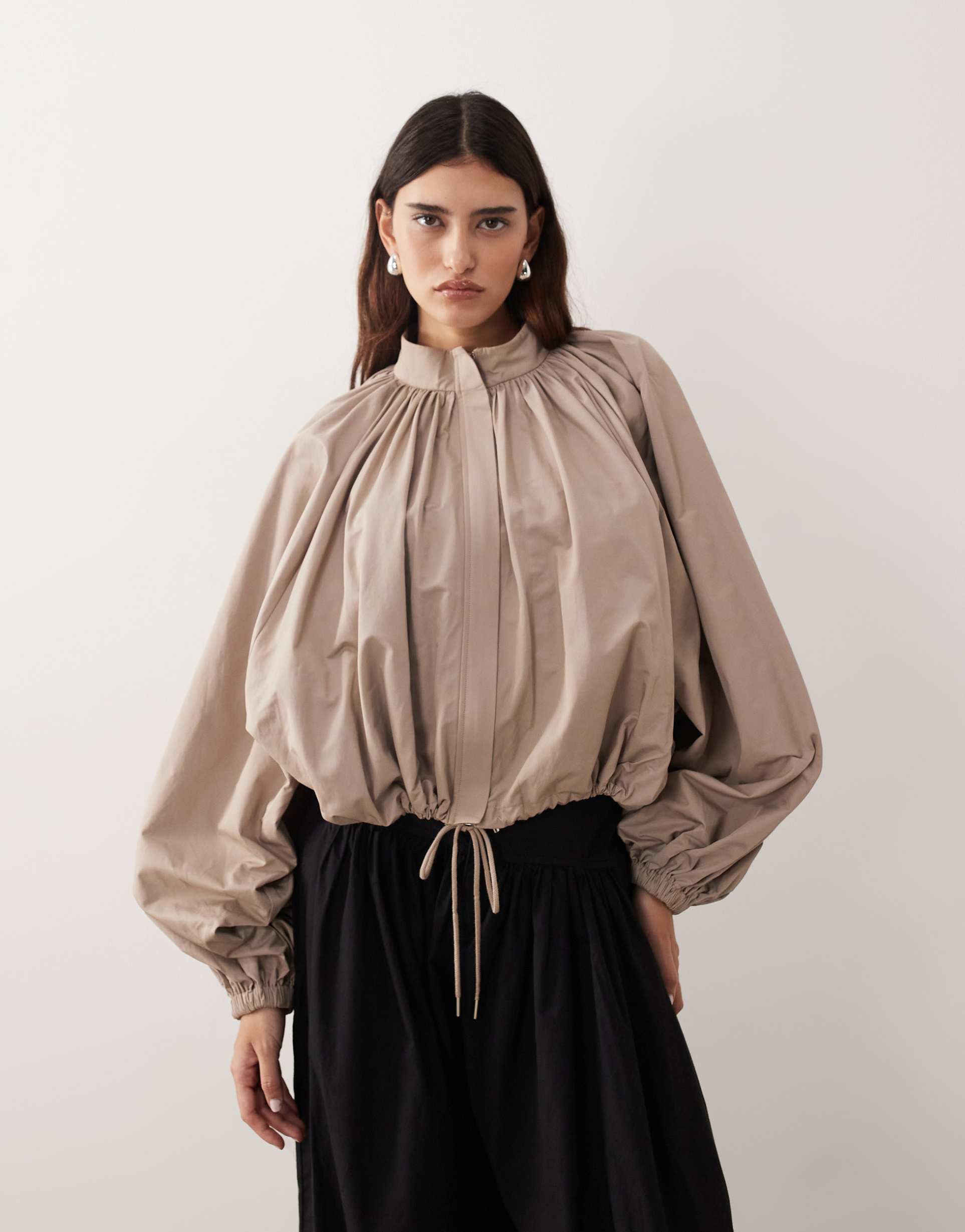arrange oversized bomber jacket with balloon sleeves in stone