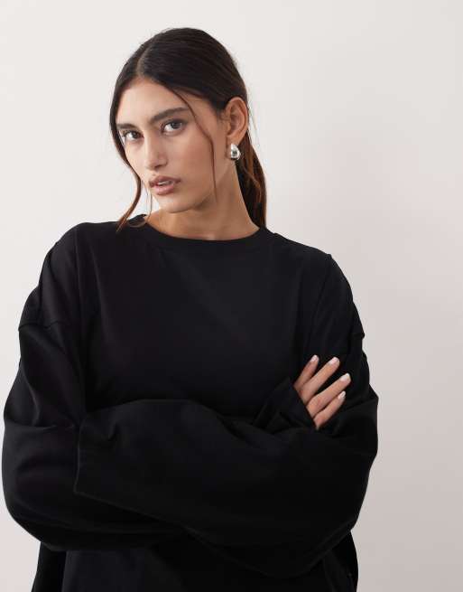 ARRANGE - Oversized T-shirt van katoen met lange mouwen in zwart, 3 van 4