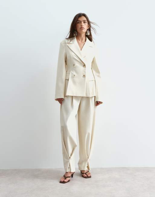 ARRANGE - Pantaloni sartoriali affusolati color crema con risvolto in coordinato