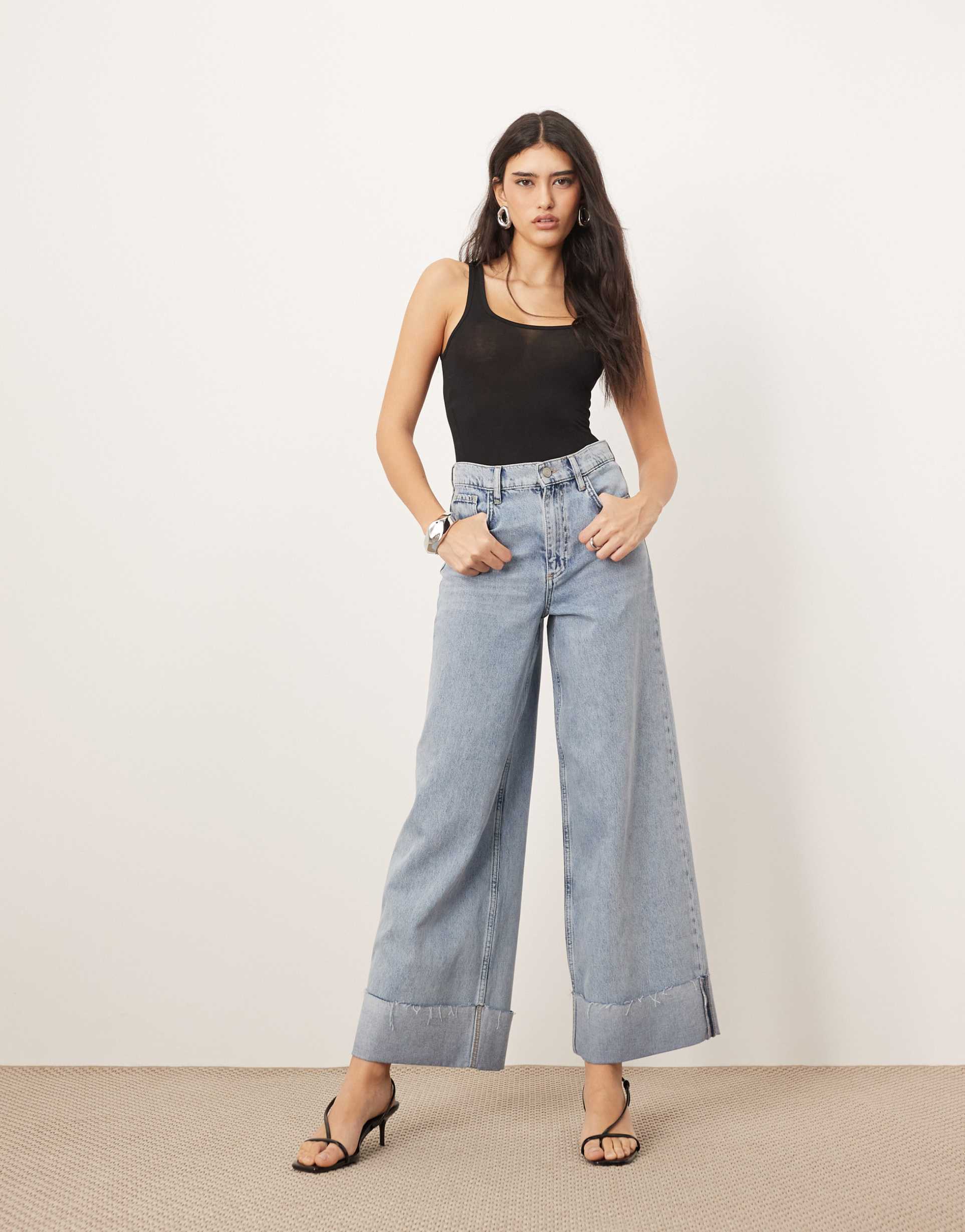 arrange parker denim high waist slouchy turn up jean in light wash blue