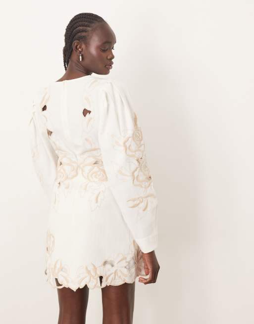 ARRANGE placed floral cutwork volume sleeve mini dress in white