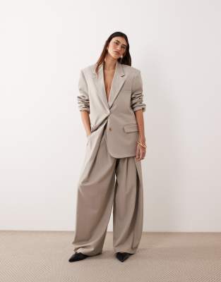 ARRANGE pleated front wide leg pants in gray - part of a set