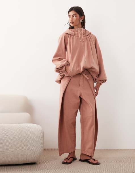 ARRANGE – Rosa, stentvättat set med jacka med dragsko och volymärmar och morotsjeans med knytning framtill - view 1