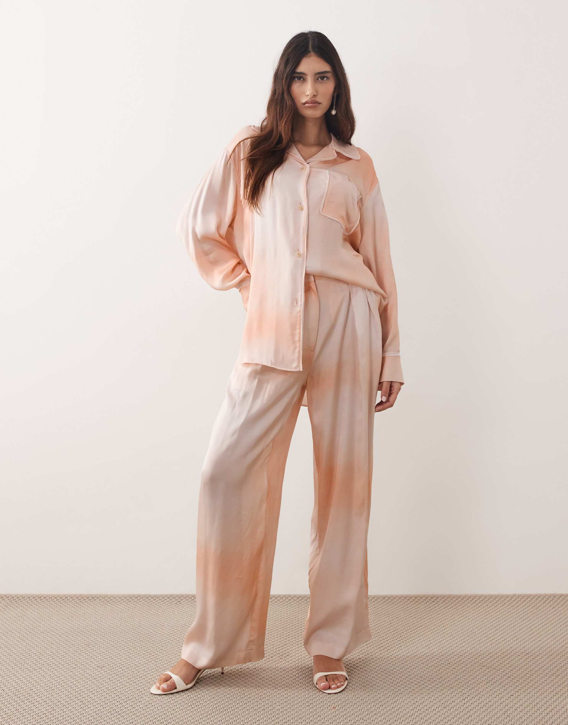 arrange satin wide leg pants in light orange - part of a set