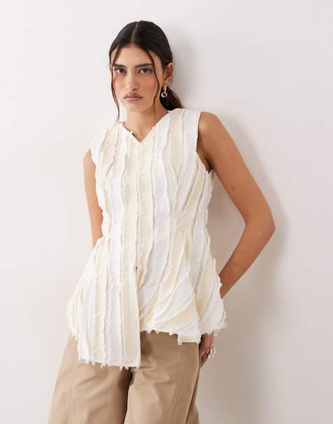 ARRANGE sleeveless raw edge pleated top in cream - view 1