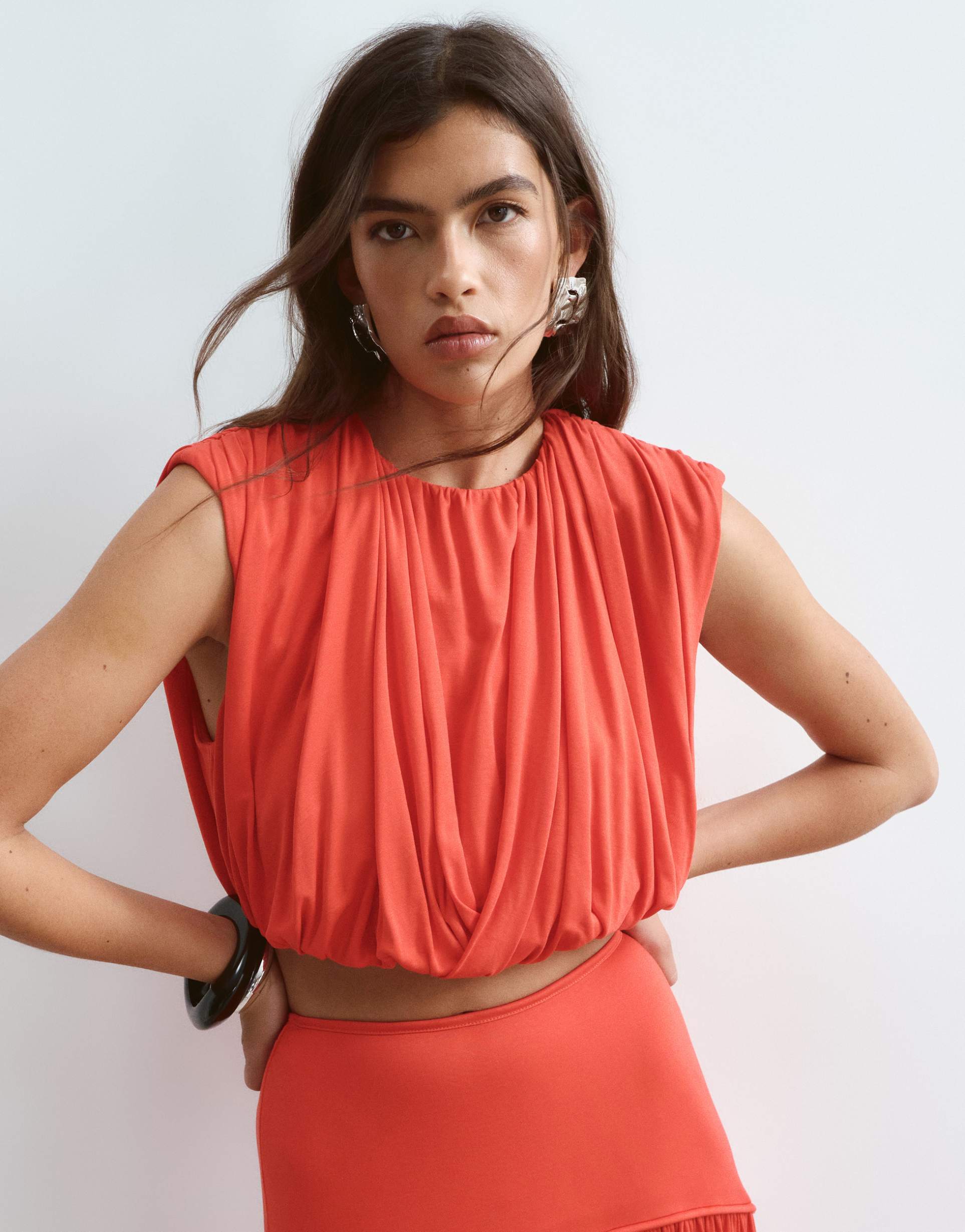 arrange strong shoulder draped top in red - part of a set