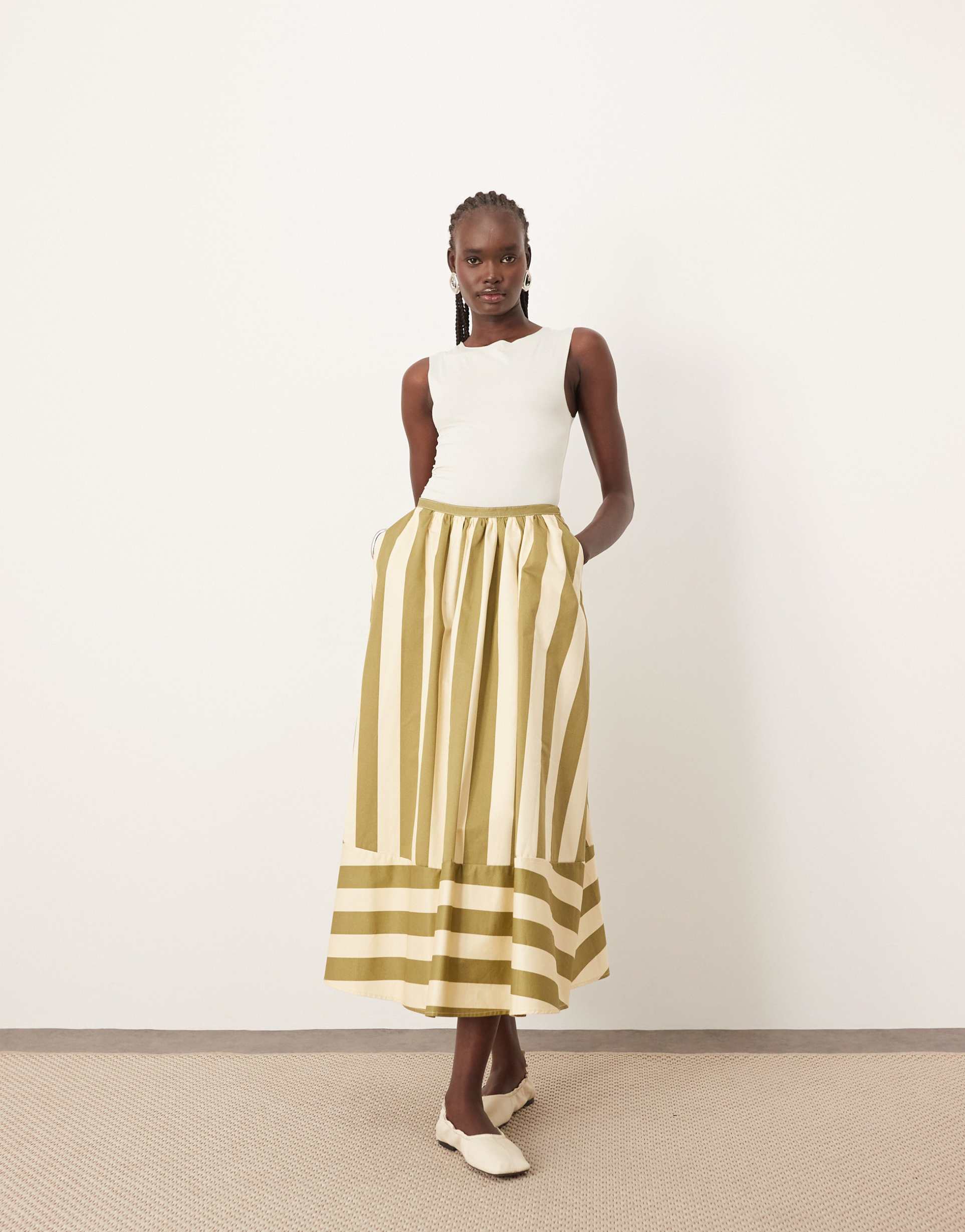 arrange structured full skirt in olive stripe