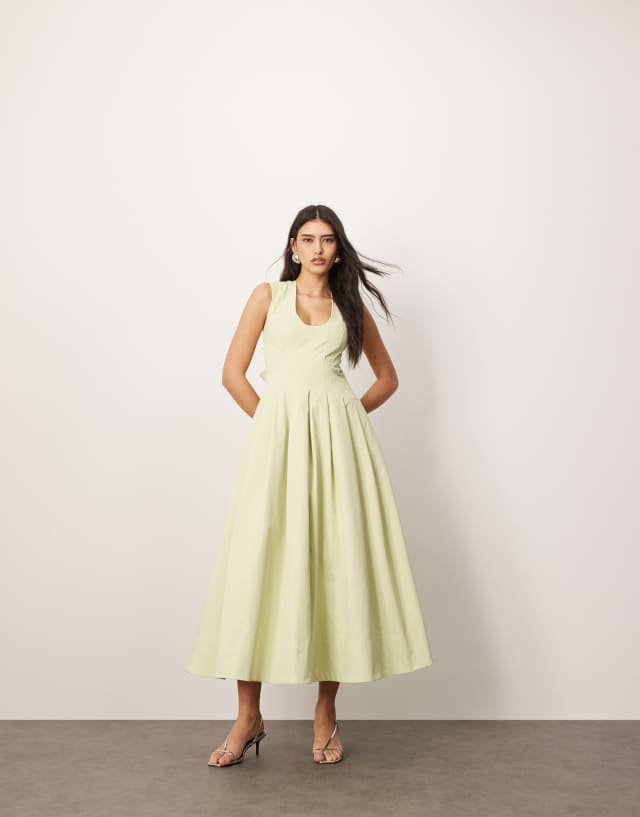 pistachio green midi dress ARRANGE structured plunge with eyelet detail in white patent