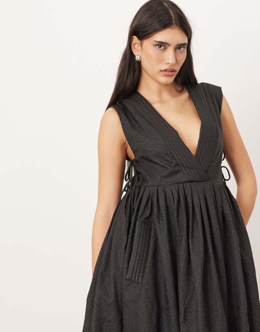 ARRANGE textured smock maxi dress with tie sides in black | ASOS