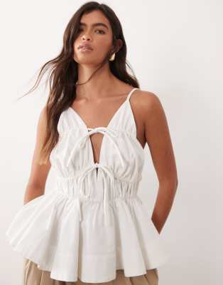 ARRANGE tie front ruched peplum cami top in white white