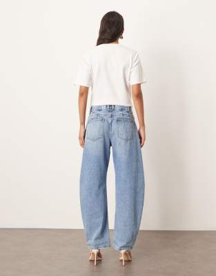 Arrange Curve Tova Tapered Curved Leg Jeans With Cuffed Hem In Blue