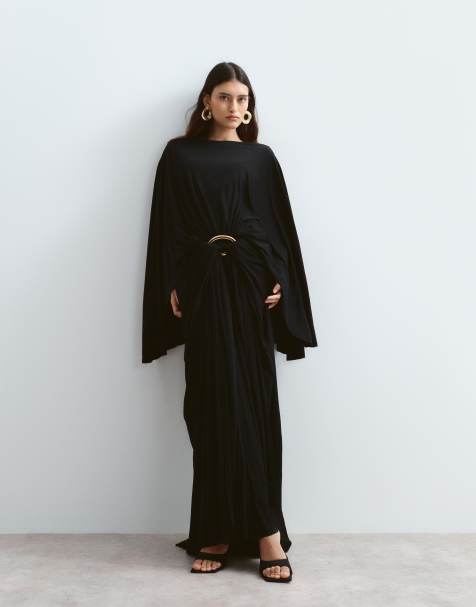 ARRANGE - vestido maxi negro de manga larga con caída y detalle de ribete con herrajes dorados - view 1