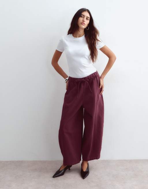 ARRANGE Willa pantalon à taille élastiquée et cordon de serrage en bordeaux délavé, 1 de 5