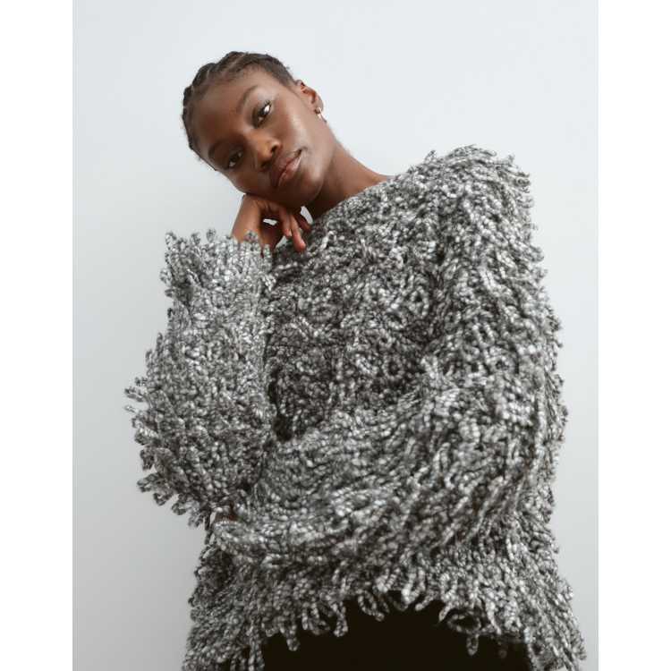 ARRANGE wool blend hand knit ultimate loop fringe sweater in gray