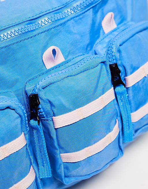 ARTSAC Jaspar Triple Pocket Sling Cross Body Bag in Blue