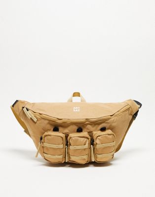 ARTSAC jaspar triple pocket sling cross body bag in stone - ASOS Price Checker