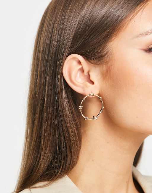 Ashiana circle earrings with moon and star details in gold