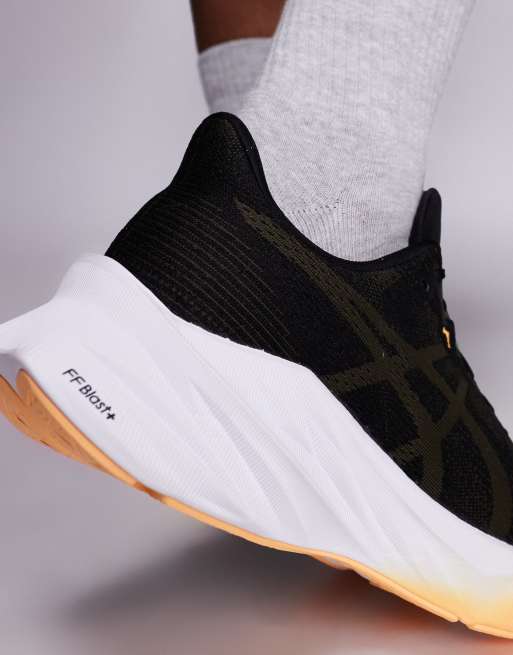Asics Dynablast 5 running trainers in black and orange fade, 4 of 5