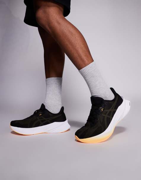 Asics - Dynablast 5 - Sneakers da corsa nere e arancioni sfumate - view 1