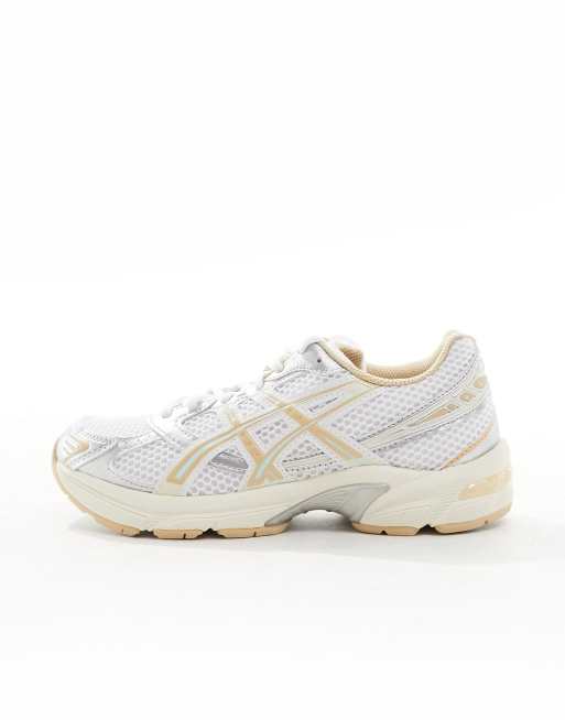 Tuta asics bianca store e oro