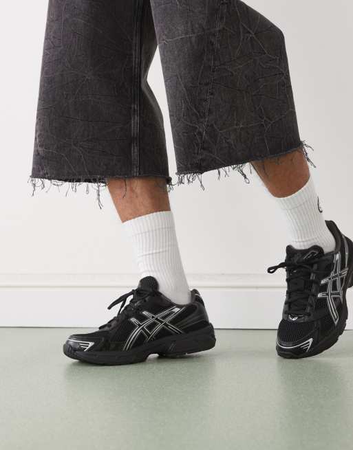 Asics Gel-1130 trainers in black and pure silver