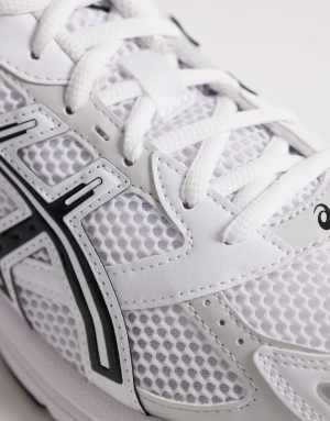 Asics Gel 1130 trainers in black and white