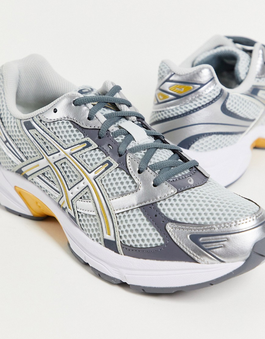 Asics Gel-1130 trainers in silver and gold