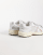 Asics GEL-1130 trainers in white and rust