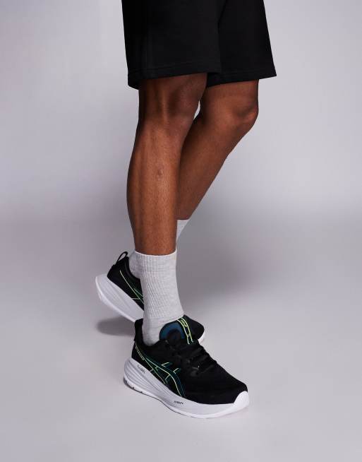 Asics - Gel-Cumulus 27 - Hardloopsneakers in zwart en geel, 4 van 5