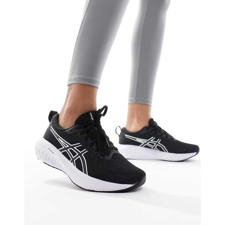 Tuta nera cheap e oro asics