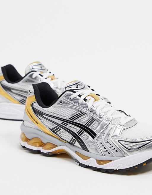 Asics Gel Kayano 14 trainers in silver and gold
