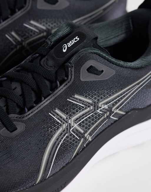 Asics Gel-Kayano 33 løbesneakers i sort og hvid, 4 af 5