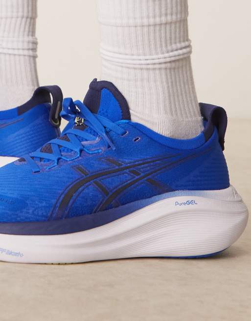 Asics Gel-Nimbus 27 running trainers in illusion blue and indigo blue