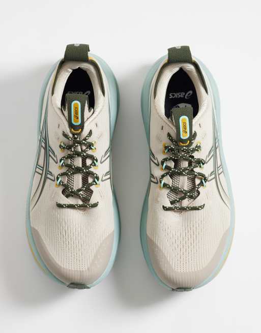Asics Gel-Nimbus 28 trail running trainers in stone and blue, 3 of 5