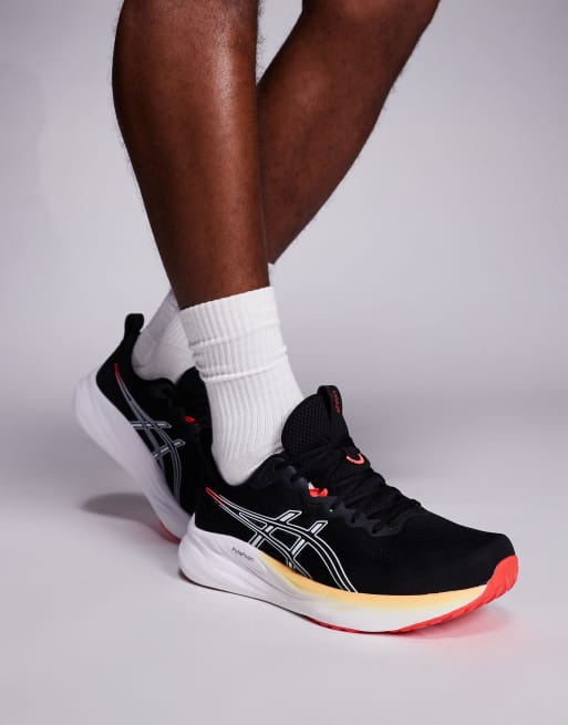 Asics Gel-Pulse 16 running trainers in black and white, 4 of 5