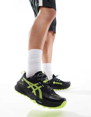 Asics Gel-Trabuco 12 GTX waterproof trail running trainers in black and neon yellow φωτογραφία