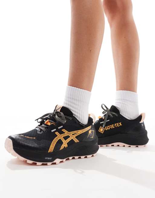 Asics – Gel-Trabuco 12 GTX – Wodoodporne buty sportowe do biegania w terenie w kolorze czarnym i pomarańczowym