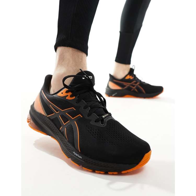 Orange shop running trainers