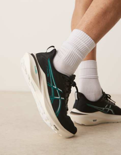 Asics GT-2000 13 running trainers in black and wave teal - view 1