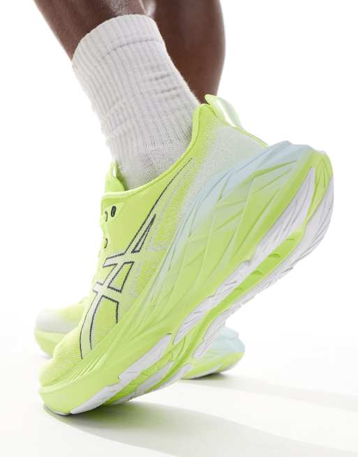 Asics - Novablast 4 - Sneakers da corsa giallo fluo e grigie, 3 di 5