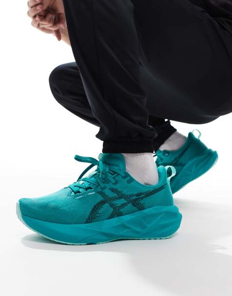 Asics – Novablast 5 – Lauf-Sneaker in Petrol und Schwarz mit Wellendetails - view 1