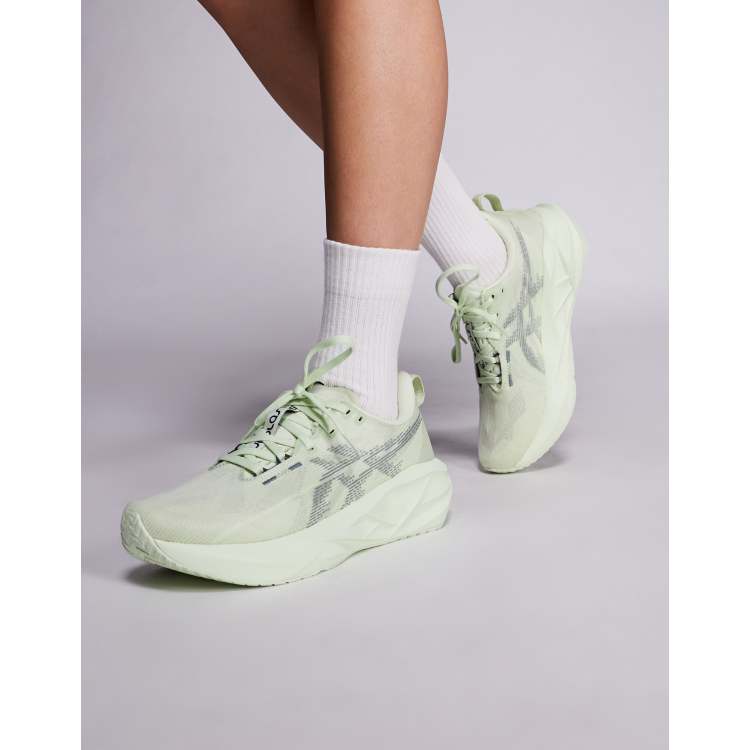 Asics Novablast running trainers in green ASOS