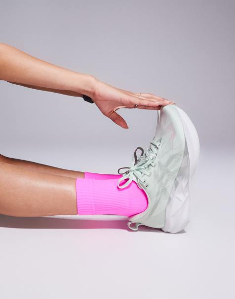 Asics - Novablast 5 - Sneakers acqua e bianche - view 1