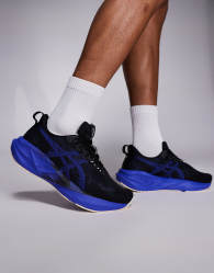 Asics Novablast 5 trainers in black and blue