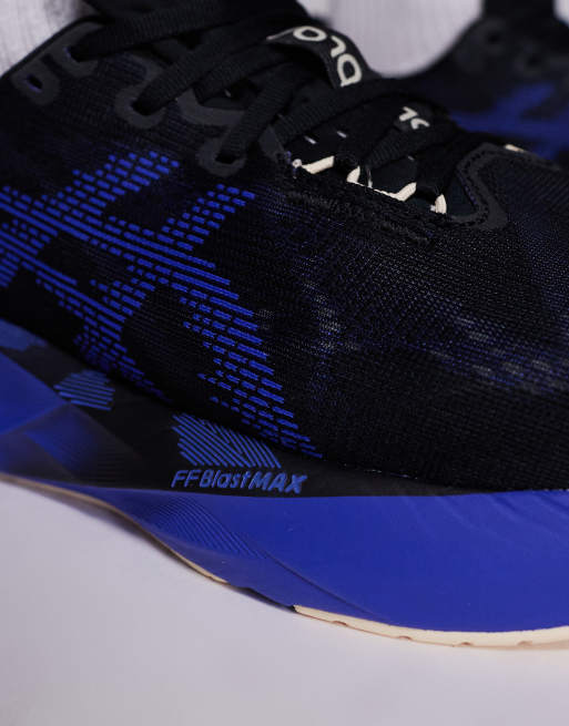 Asics Novablast 5 trainers in black and blue , 3 of 5