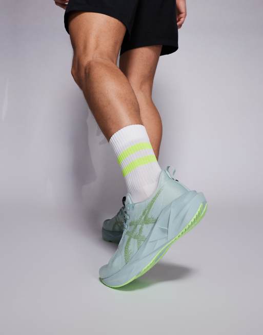 Asics Novablast 5 trainers in sage green, 4 of 5
