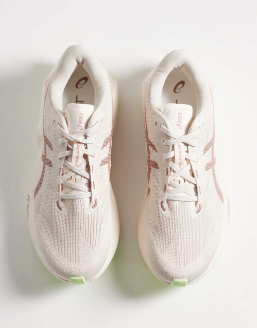 ASICS Novablast 6 hardloopsneakers in roze en geel, 2 van 5