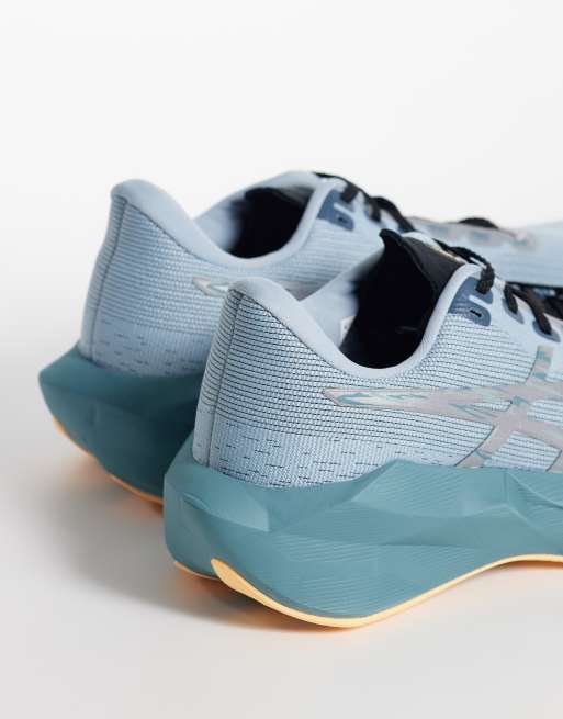 Asics Novablast 6 Lite-Show running trainers in grey with orange detail, 2 of 5